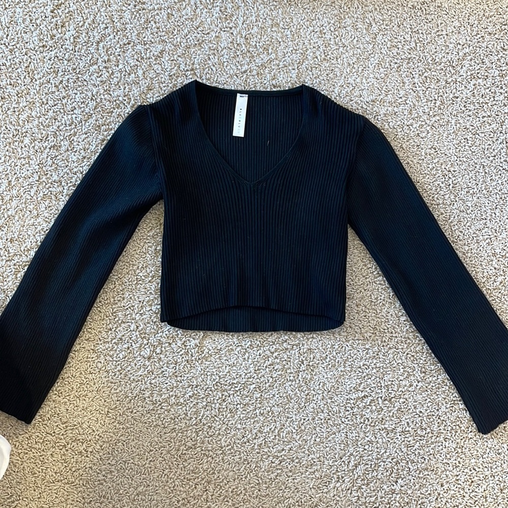 Black v-neck long sleeve shirt. Size small